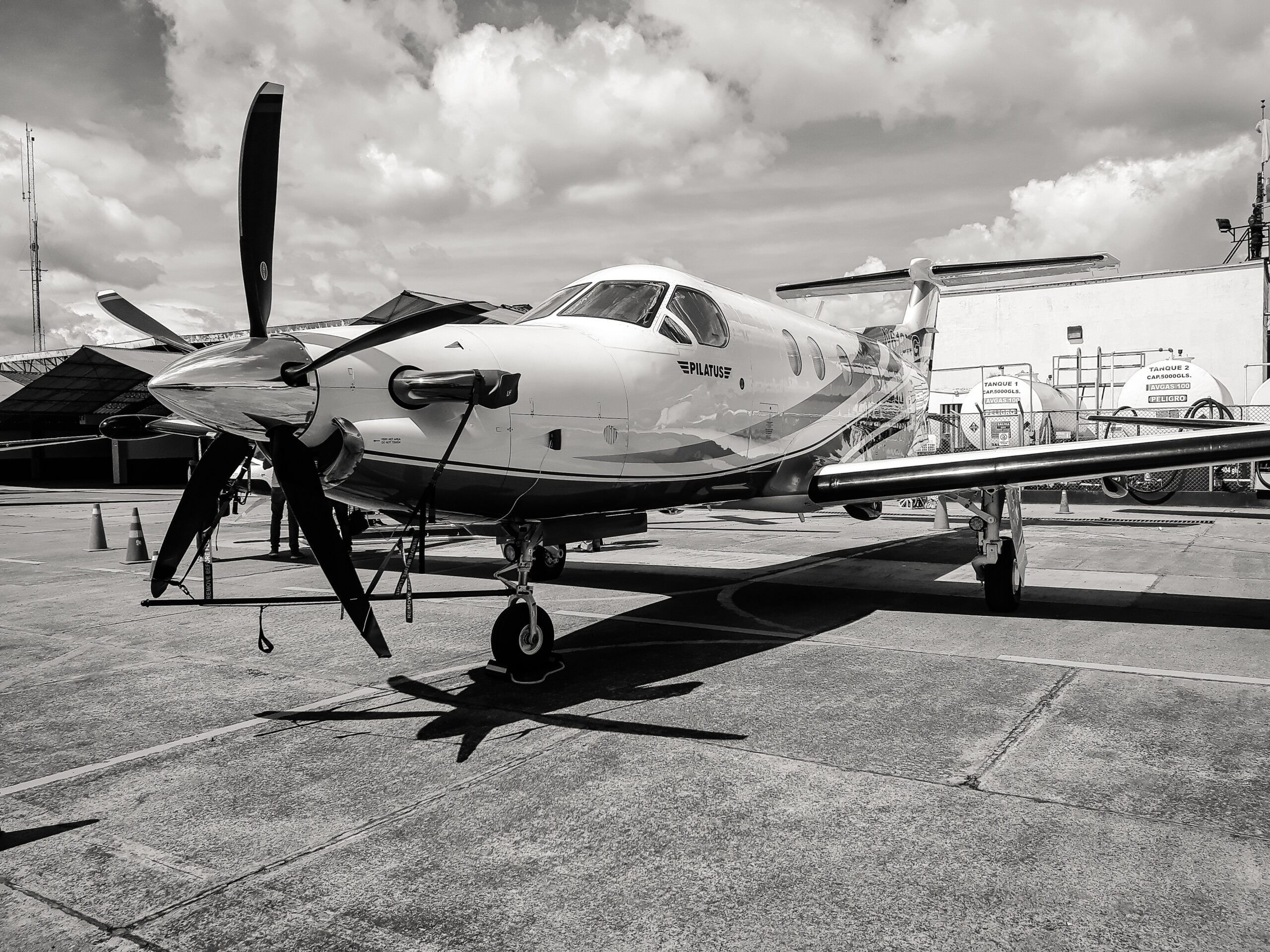 Black and white photo of a Pilatus PC-12 aircraft - Vox Concierge